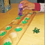 Mancala played with pom poms