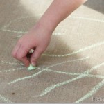 Summer fun with water and chalk for fine motor