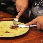Cutting with a knife and fork