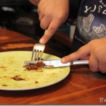 Cutting with a knife and fork