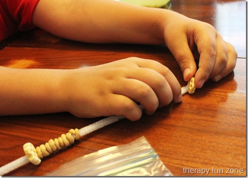 stringing cheerios 2web