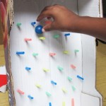 Playing plinko to work on hand strength and writing